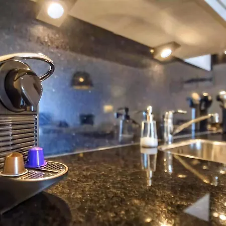 Апартаменты Modern In With Balcony